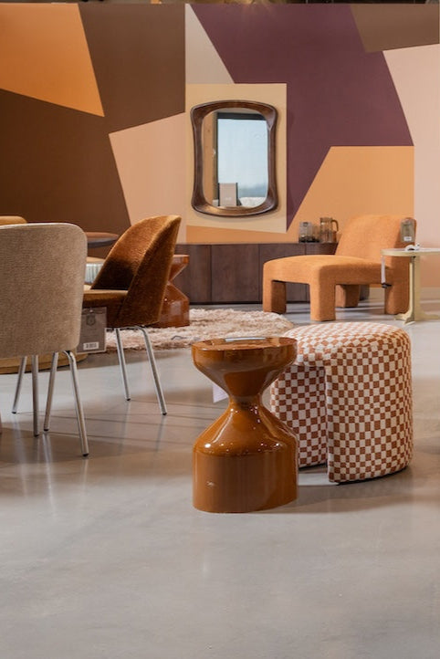 Stijlvolle stijlkamer in het Experience Center, ingericht met diverse meubels en accessoires.